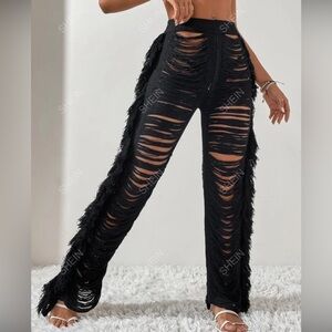 sxy pants with opening and woven fringe trim size L 8/10